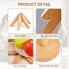 A set of tree - shaped wooden items including 4 trivets for hot dishes, pots, and pans, along with 1 stand.